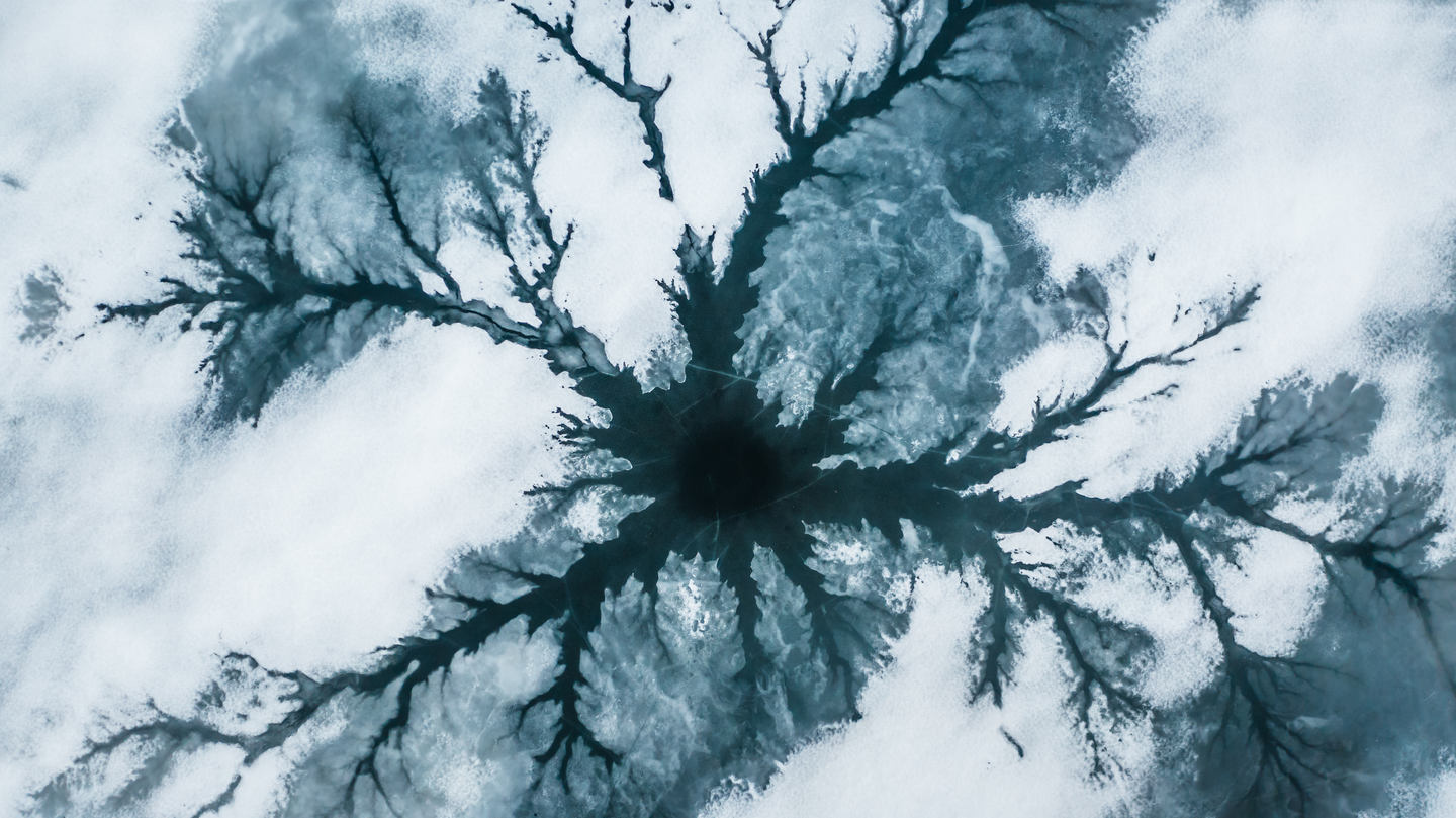 Aerial Photography of Thawing Lake in Norway by Jan Erik Waider