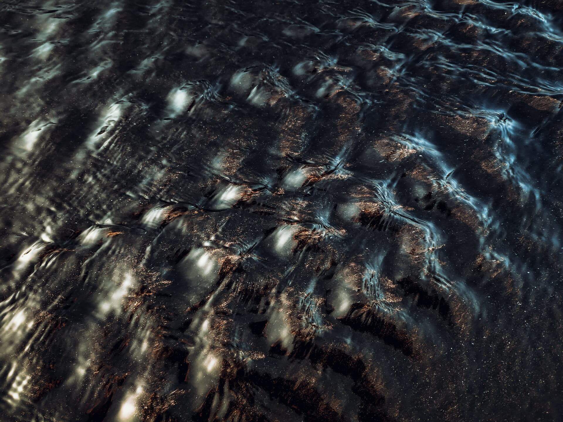 Water over Black Sand Beach in Iceland, captured by Jan Erik Waider