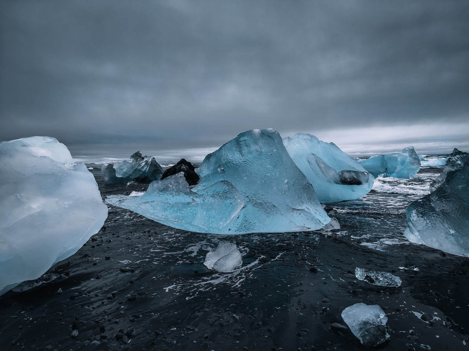 Photography of Icebergs on Black Sand Beach in Iceland by Jan Erik Waider