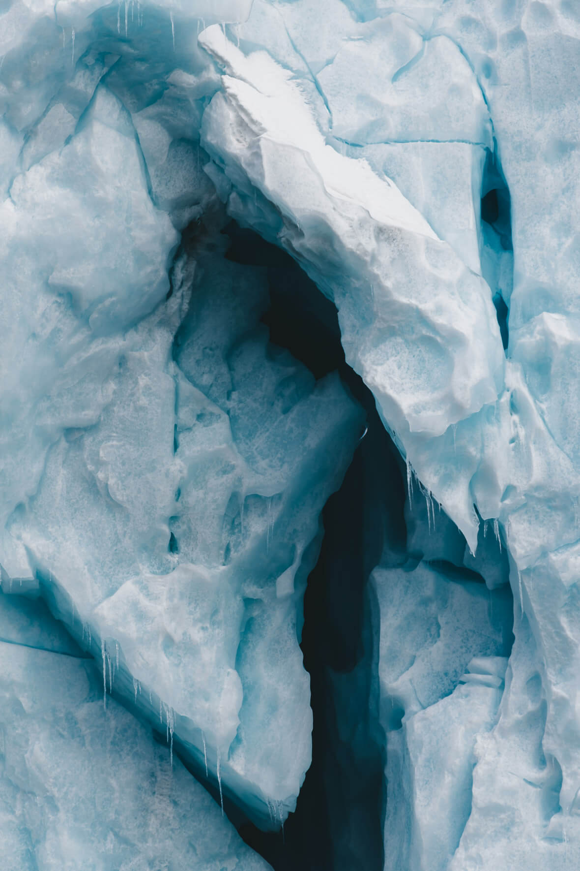 Blue and white ice of an iceberg in Greenland