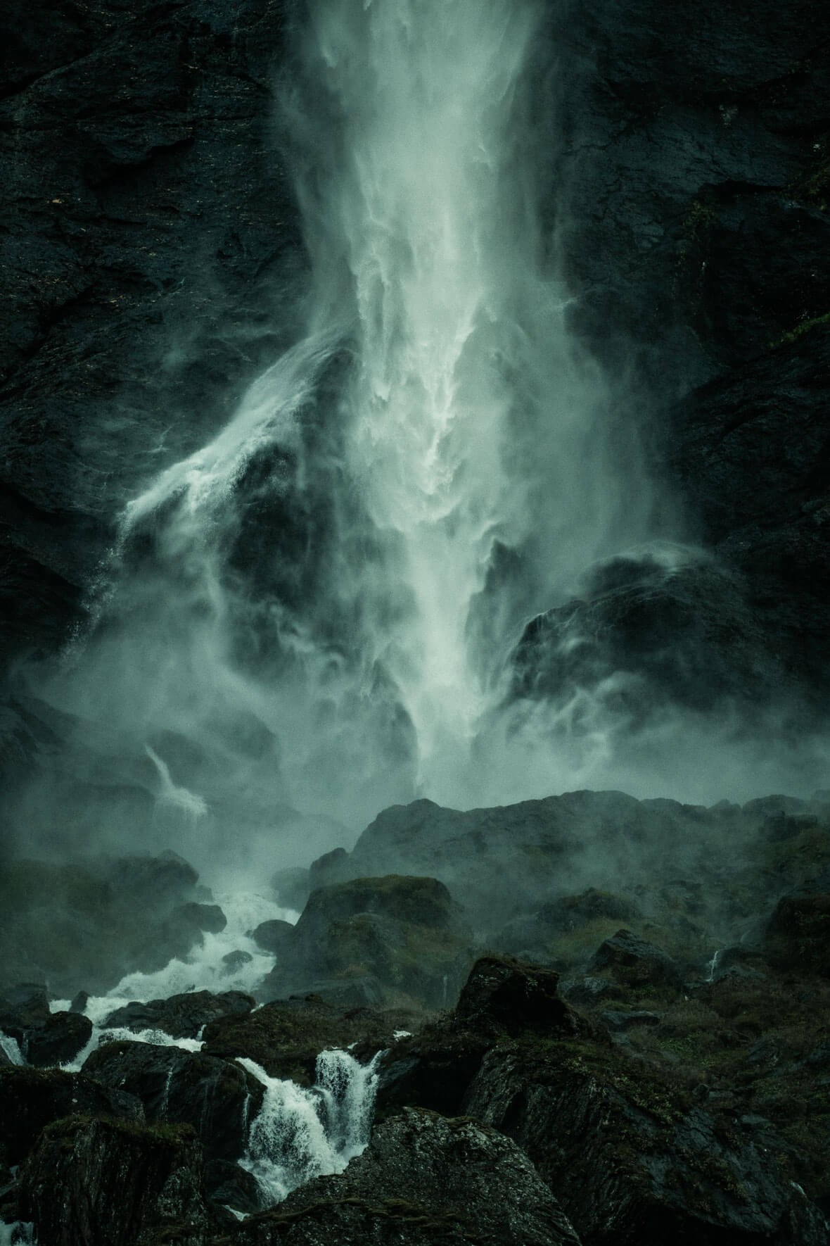 Dark and moody waterfall in Norway