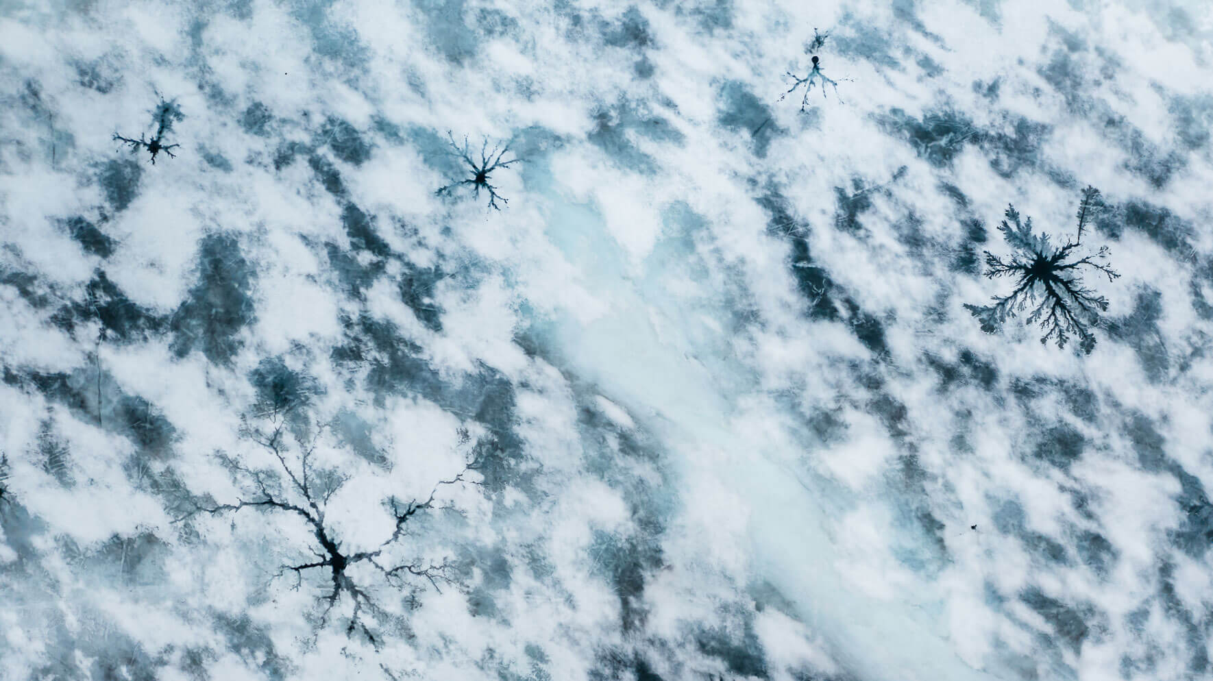 Abstract aerial photography of a frozen lake in the Hardangervidda National Park in Norway