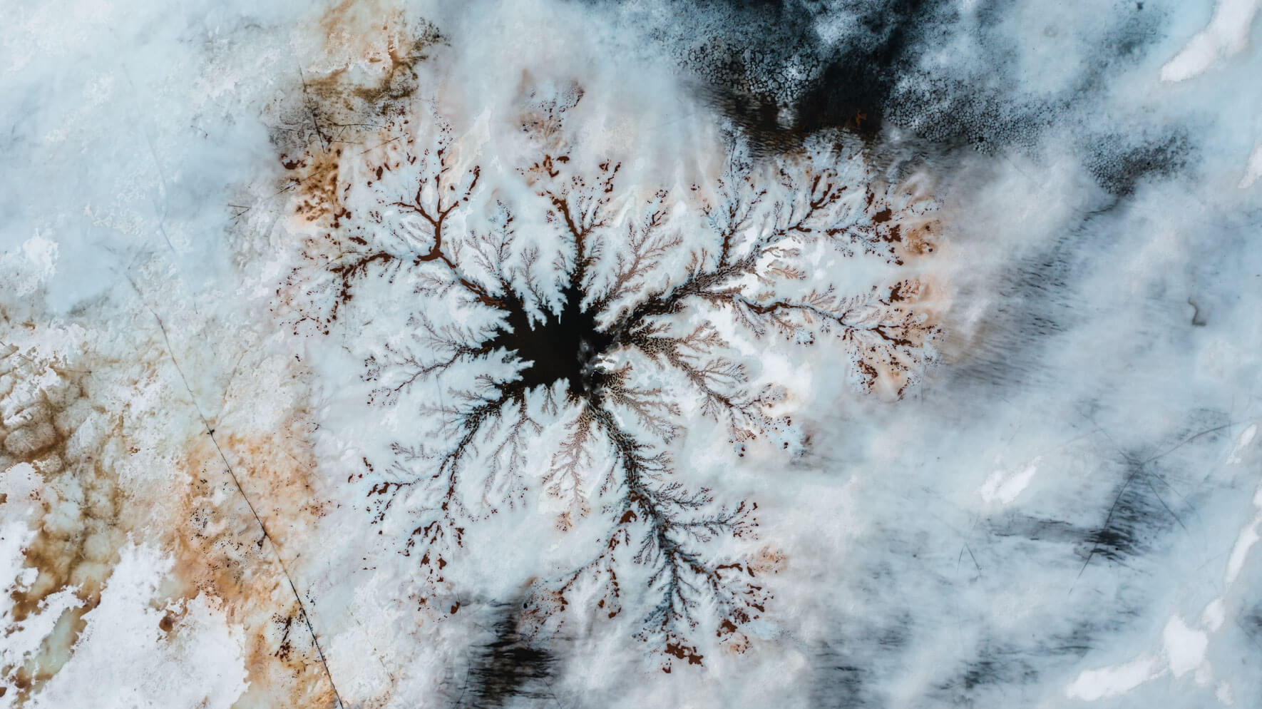 Fractal patterns of a frozen lake in Norway seen from a drone