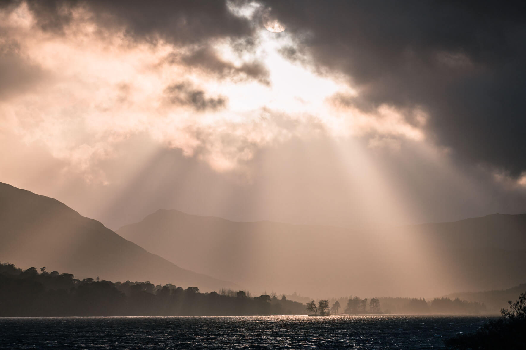 Sun beams over Black Mount / Loch Tulla in Scotland