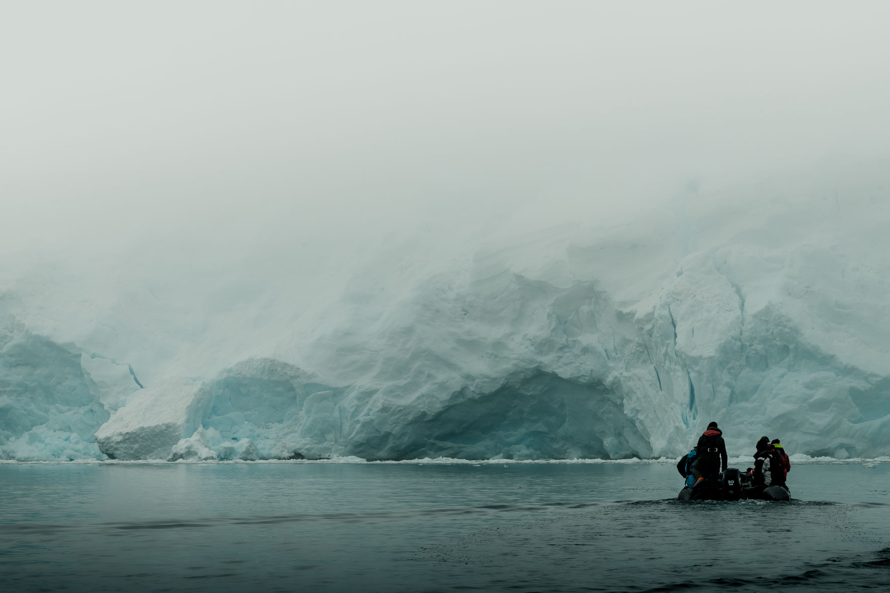 Zodiac cruise between icebergs of Antarctica