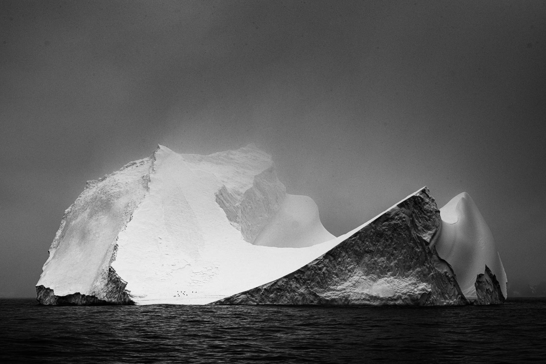 Tabular iceberg in Antarctica in black and white