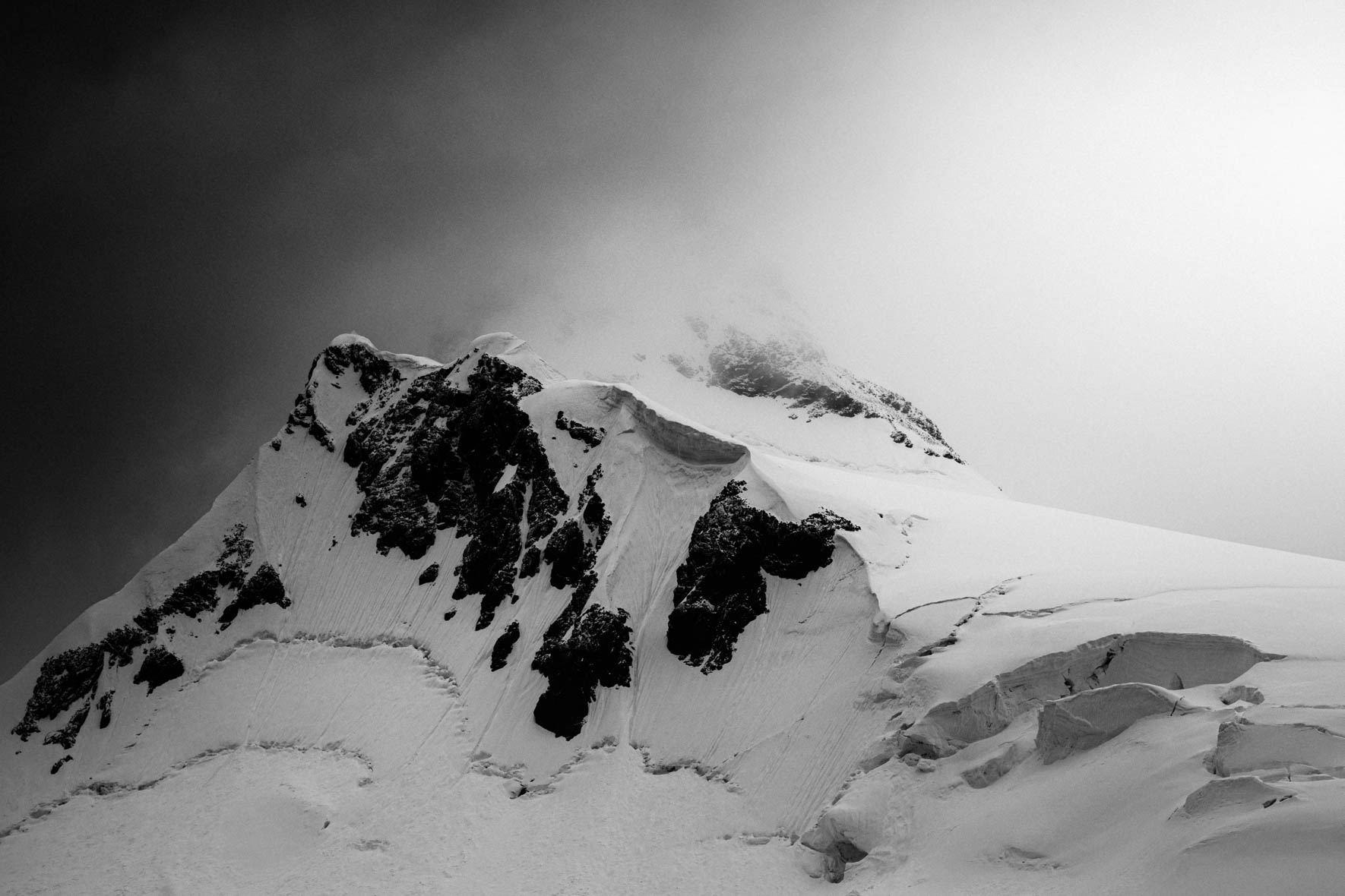 Black and white photo of glacier and mountain in Antarctica