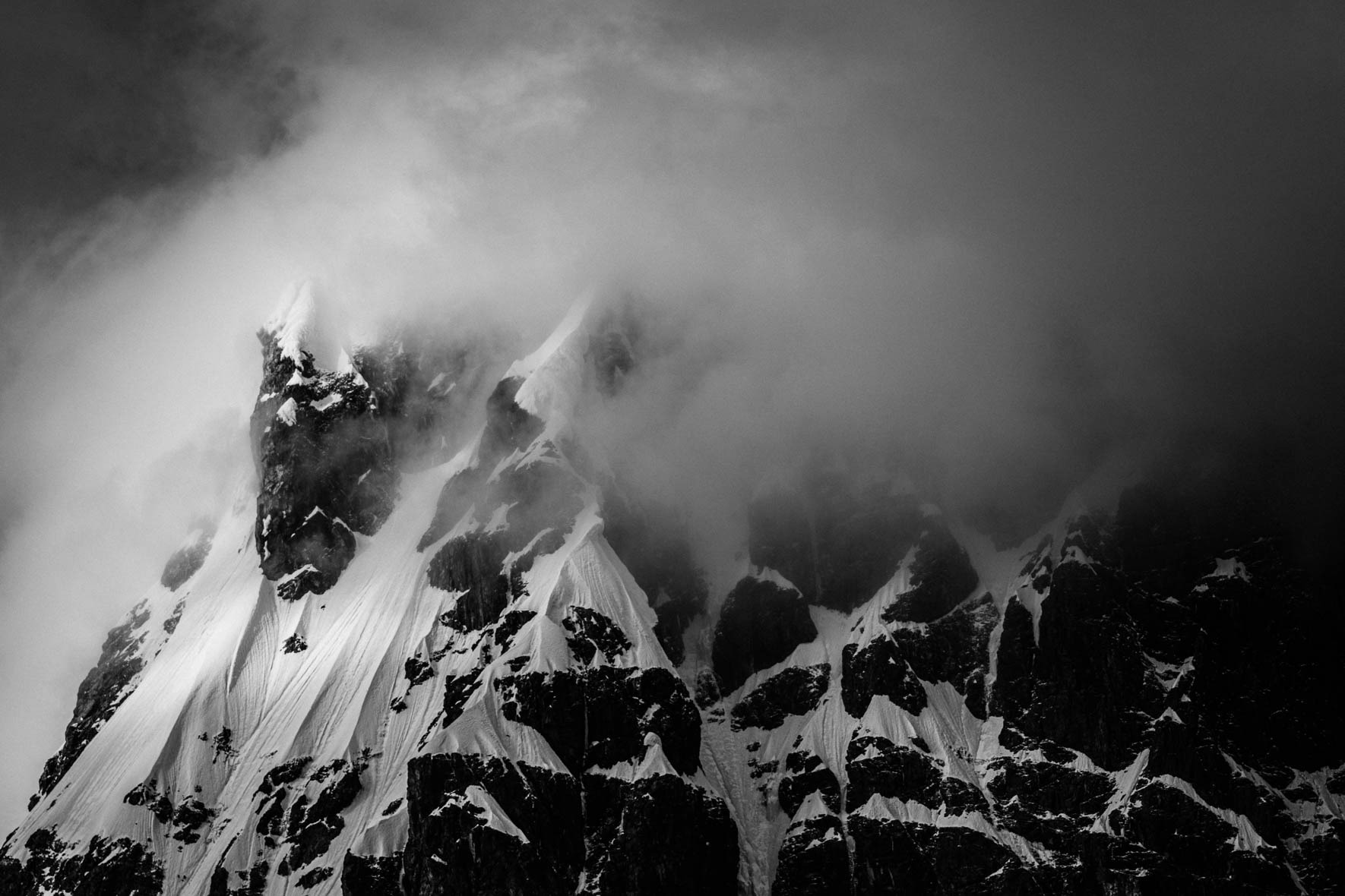 Mountain in the clouds in Antarctica