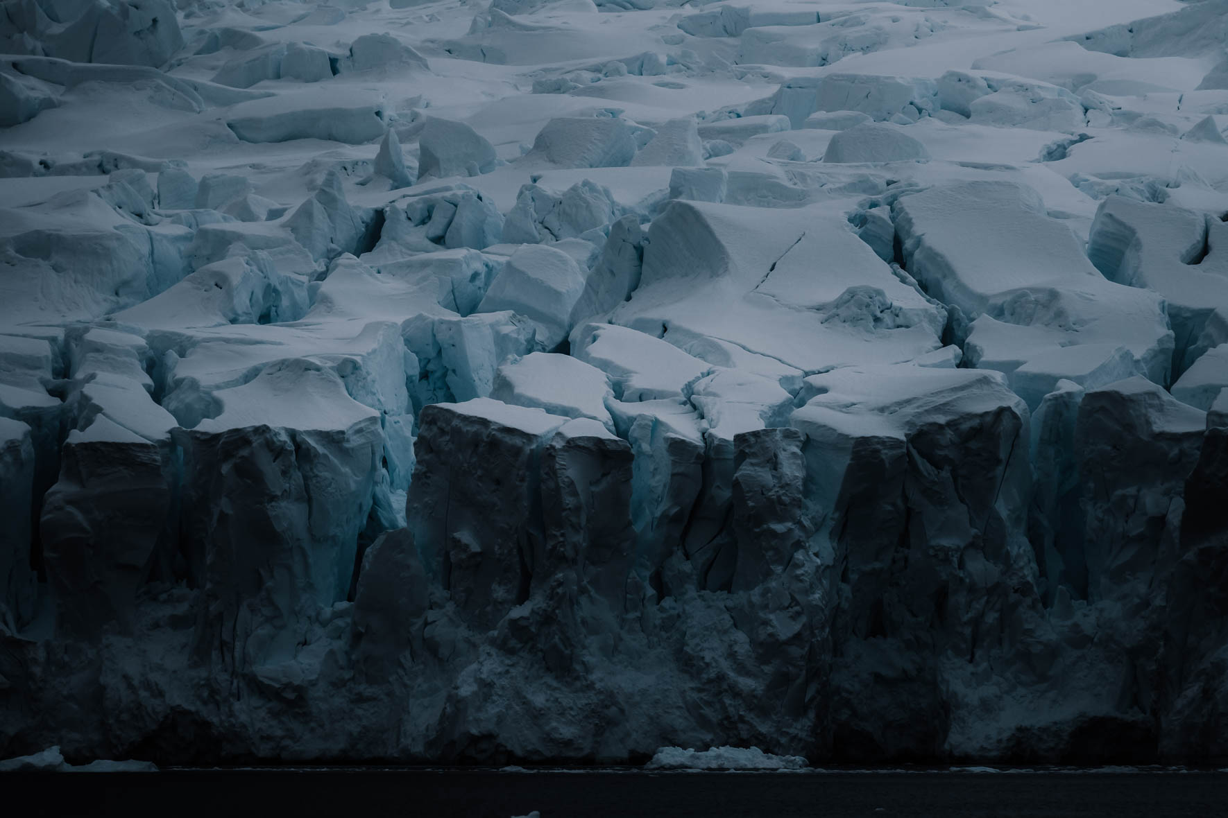 Dark and moody glacier landscape of Antarctica