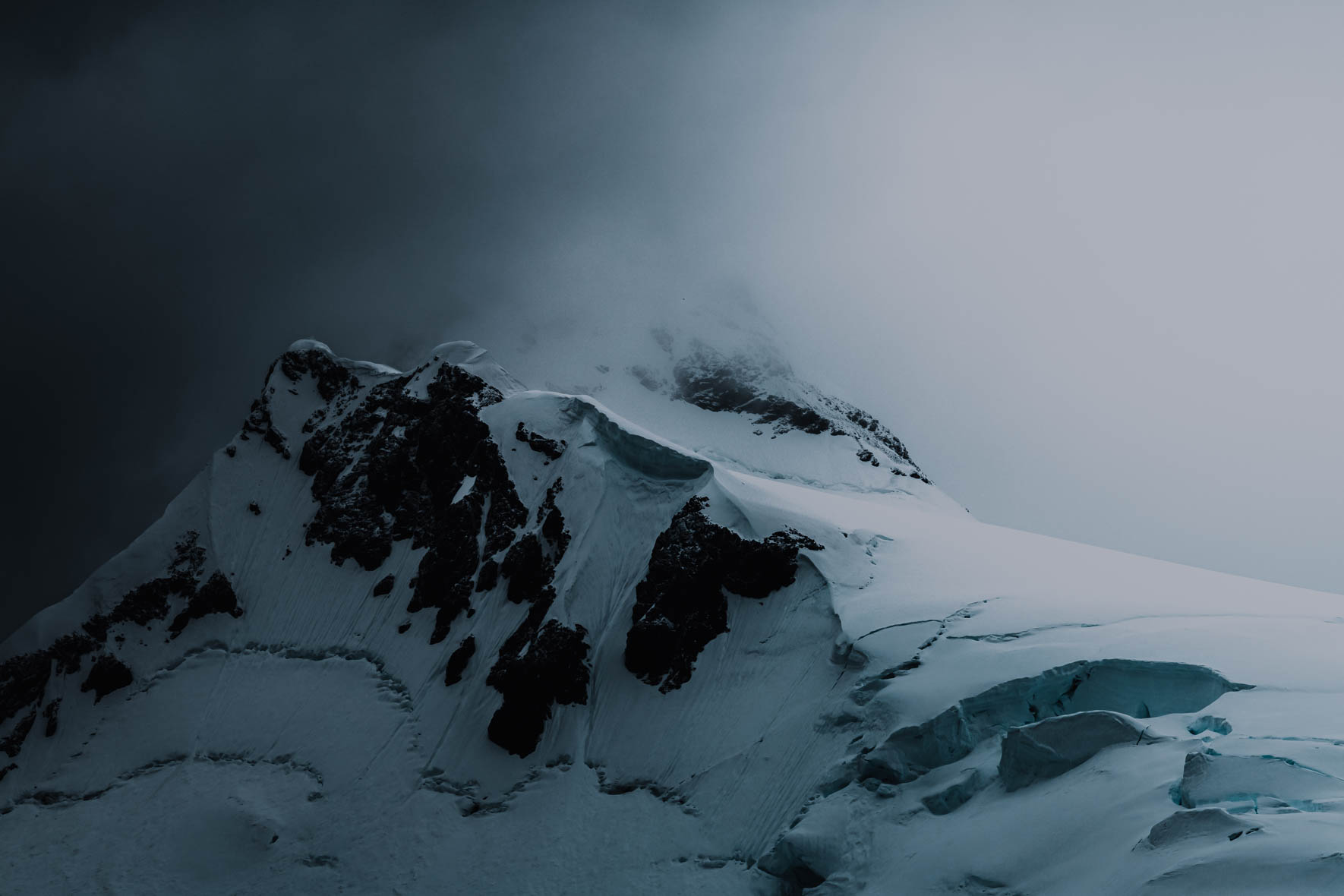 Snowy mountain with dramatic light on the Antarctic Peninsula