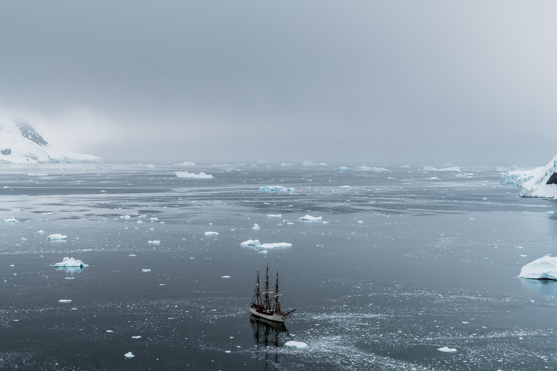 Sailing ship Bark Europa in Neko Harbor, Antarctica