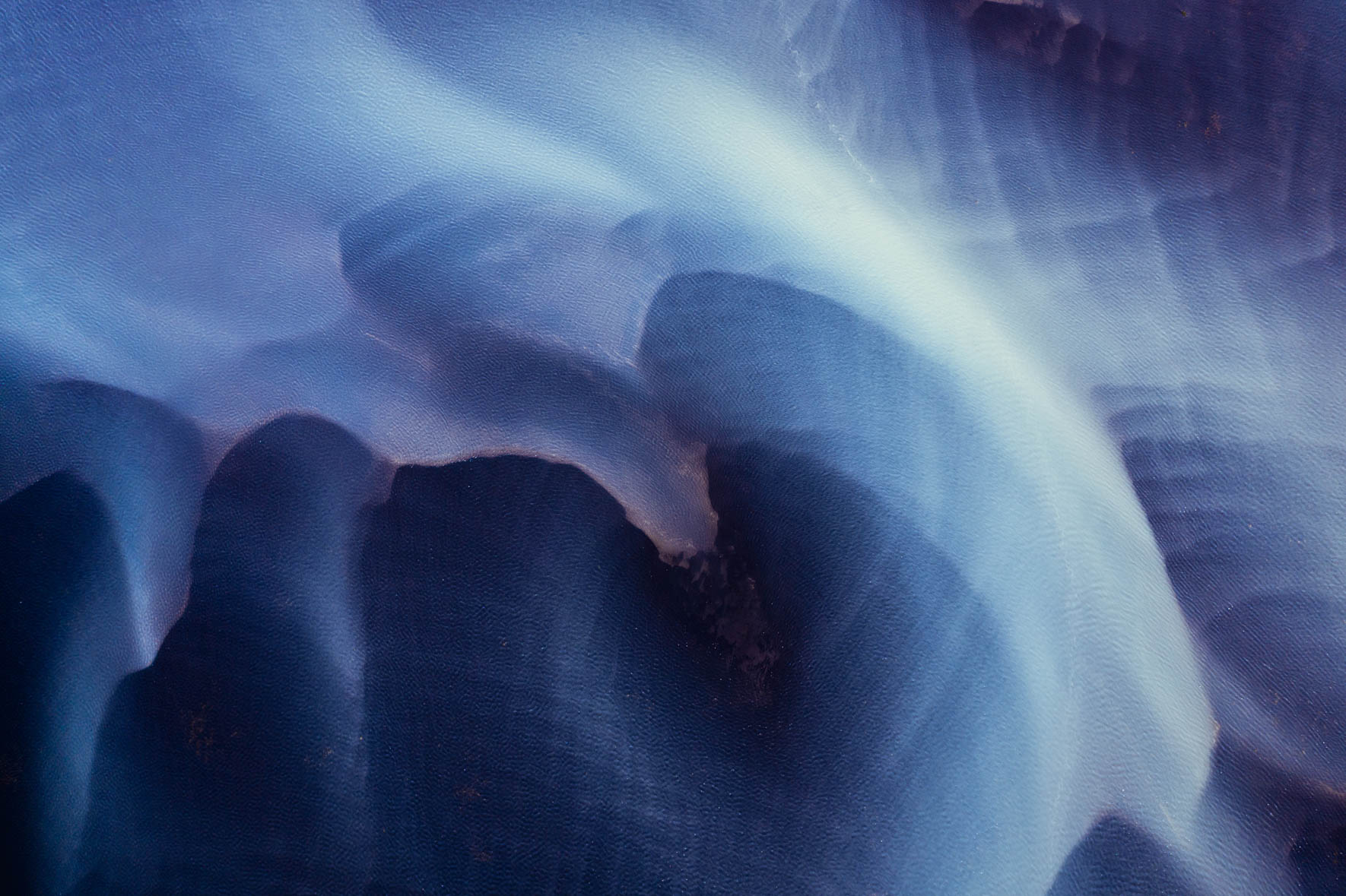 Purple and Blue Colors of Glacier River in Iceland