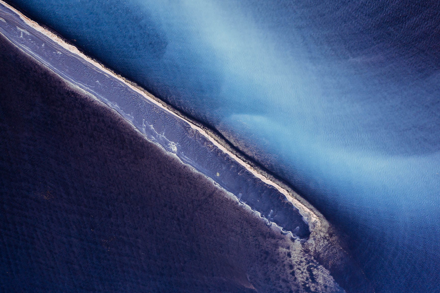 Sandbank with Glacial River in Iceland (Aerial View)