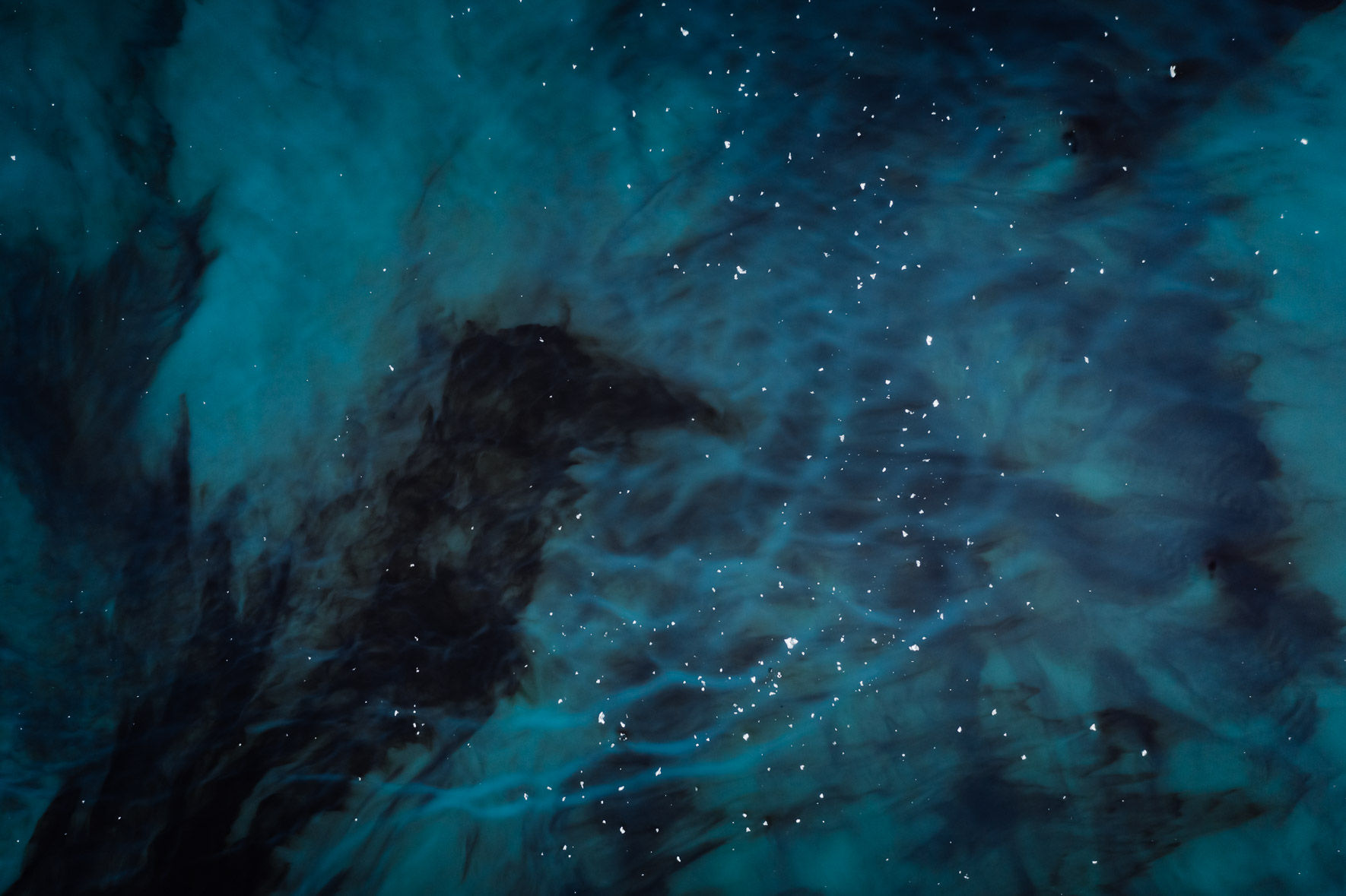 Aerial photography of abstract glacier lake in blue colors