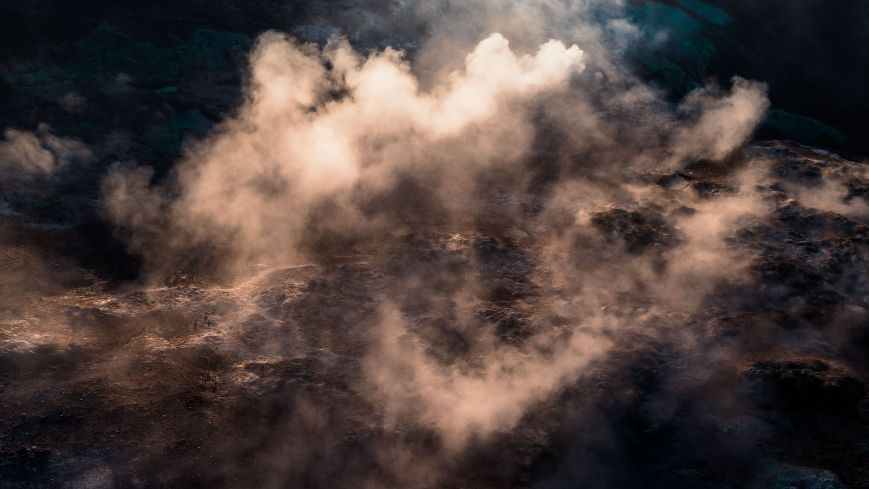 Steam Coming out of Mud Pot of Námafjall in Iceland