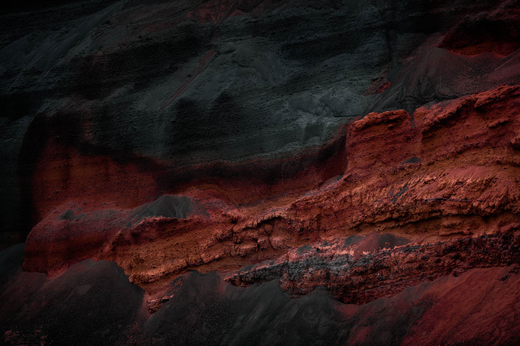 Volcanic Red Rocks and Black Sand in Iceland