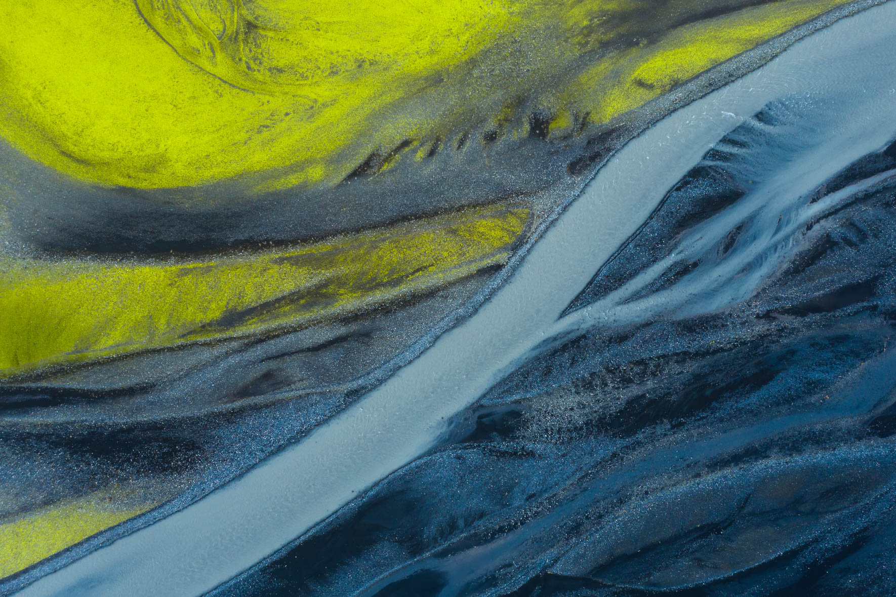 Aerial Photography of Neon Green Moss and River in Iceland