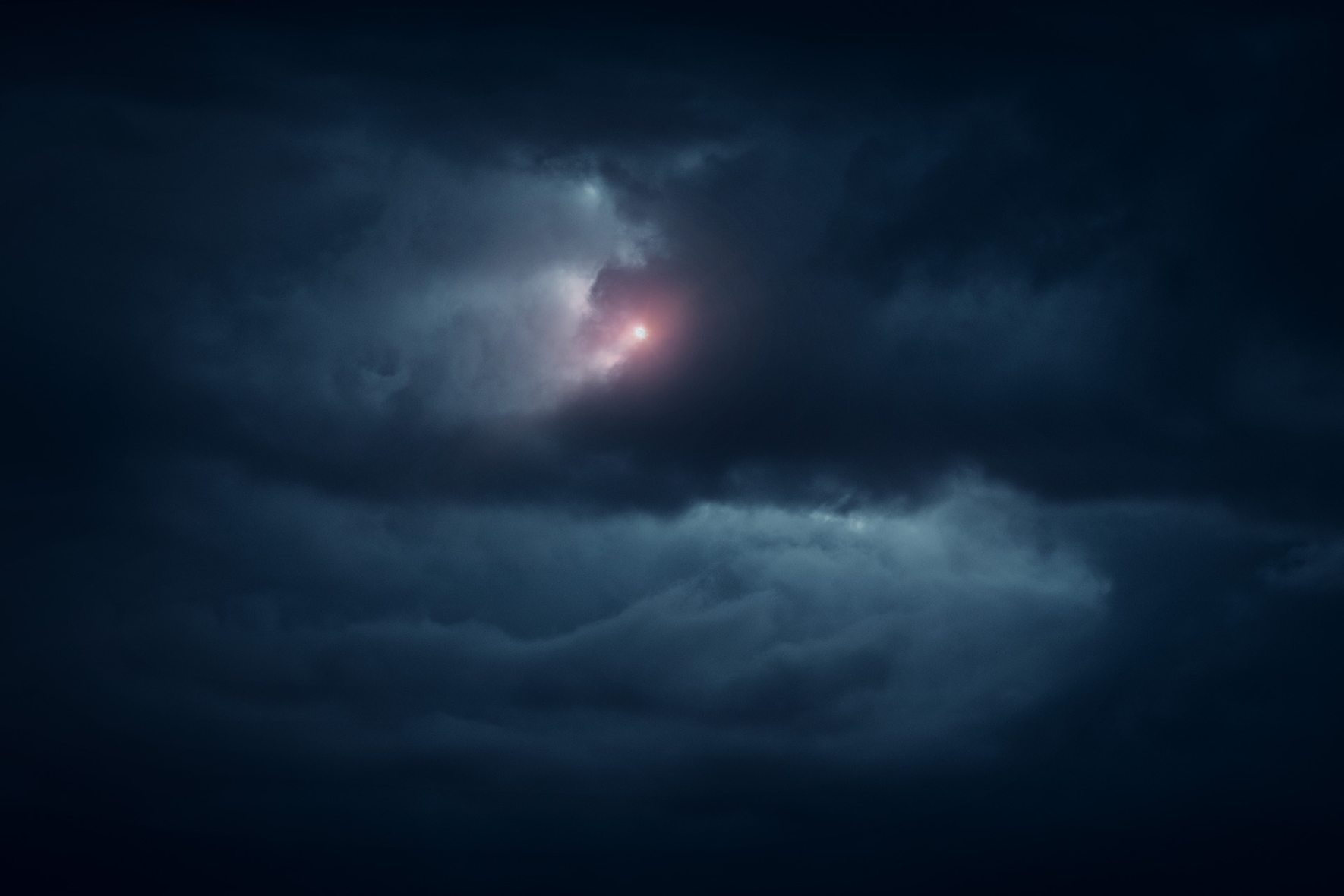 Strange light breaking through the clouds