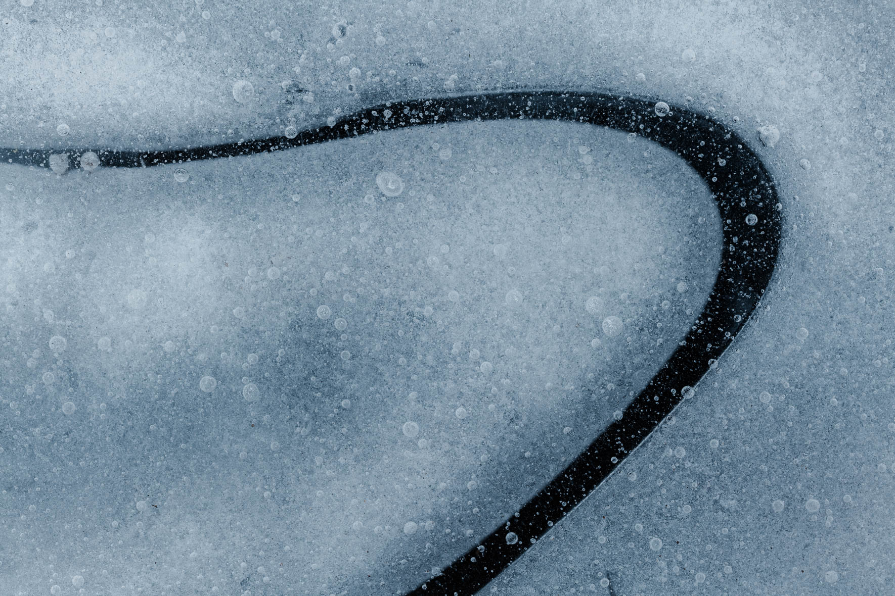 Abstract Macro Photography of Frozen Puddle