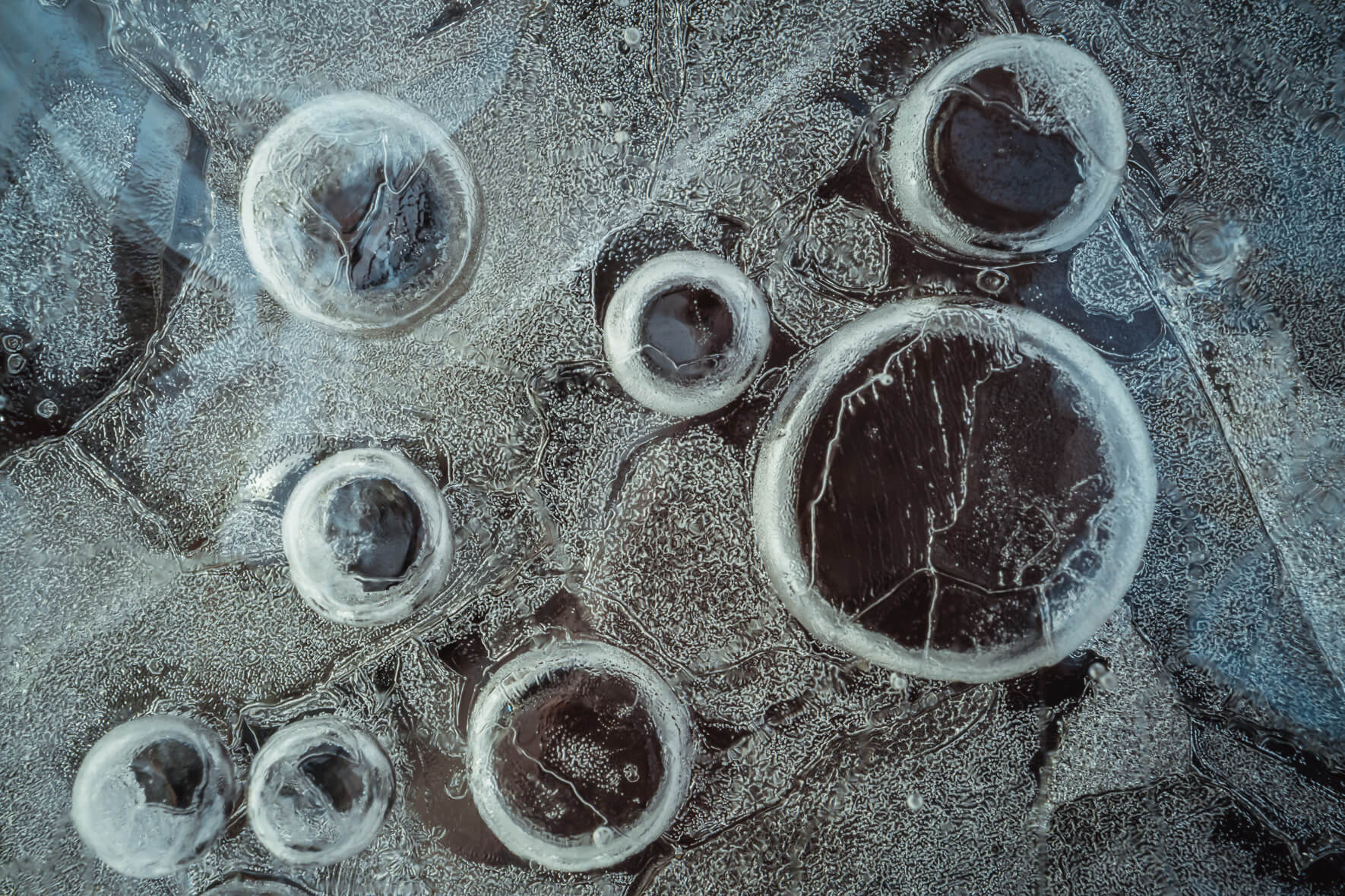 Abstract Macro Photography of Air Bubbles in Frozen Creek
