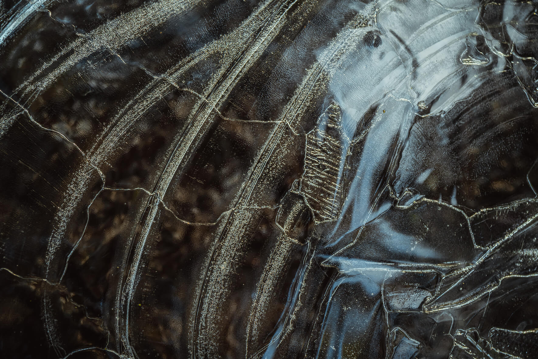 Abstract Texture of Frozen Lake with Light Reflections