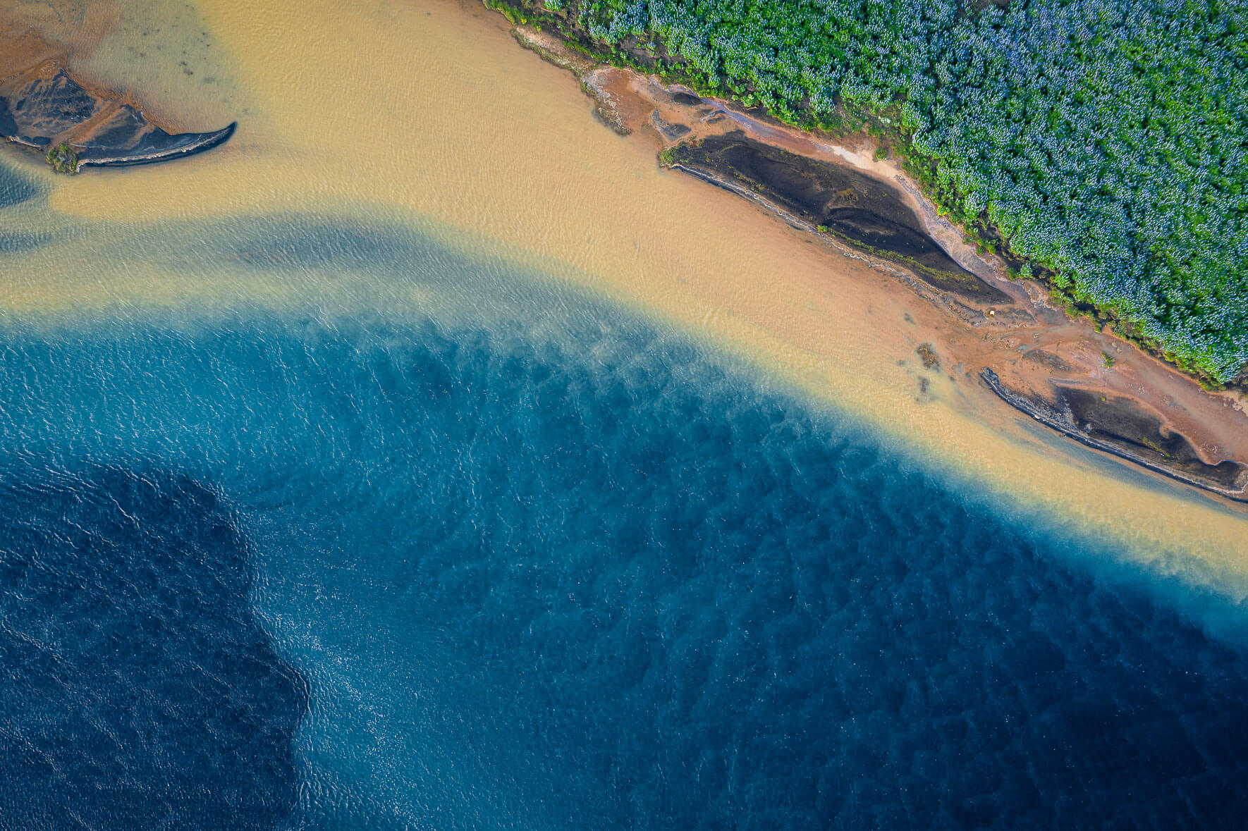 Colorful Holsa river on the south coast of Iceland