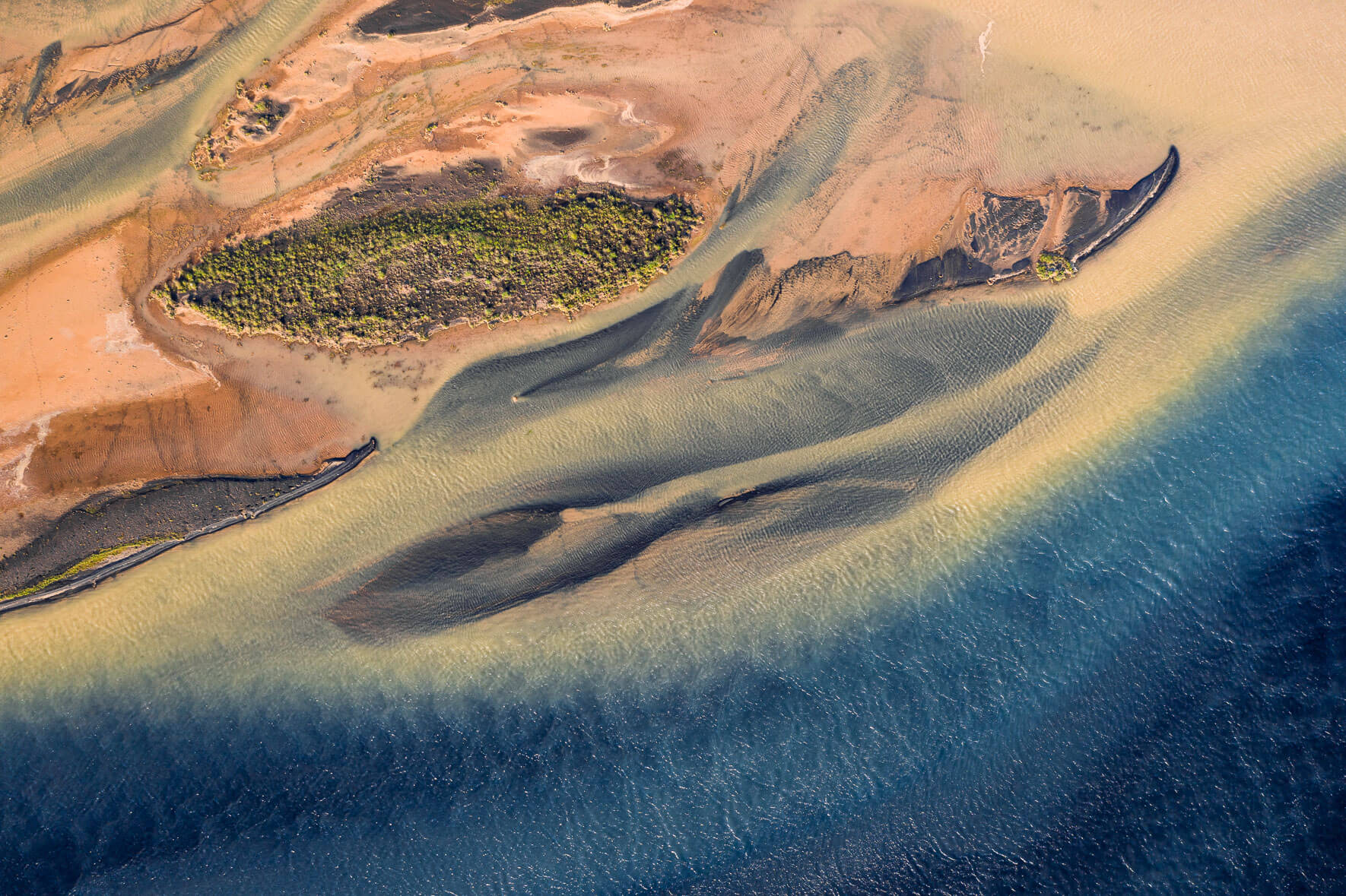 Abstract aerial view of Holsa river on the south coast of Iceland with small sandbanks
