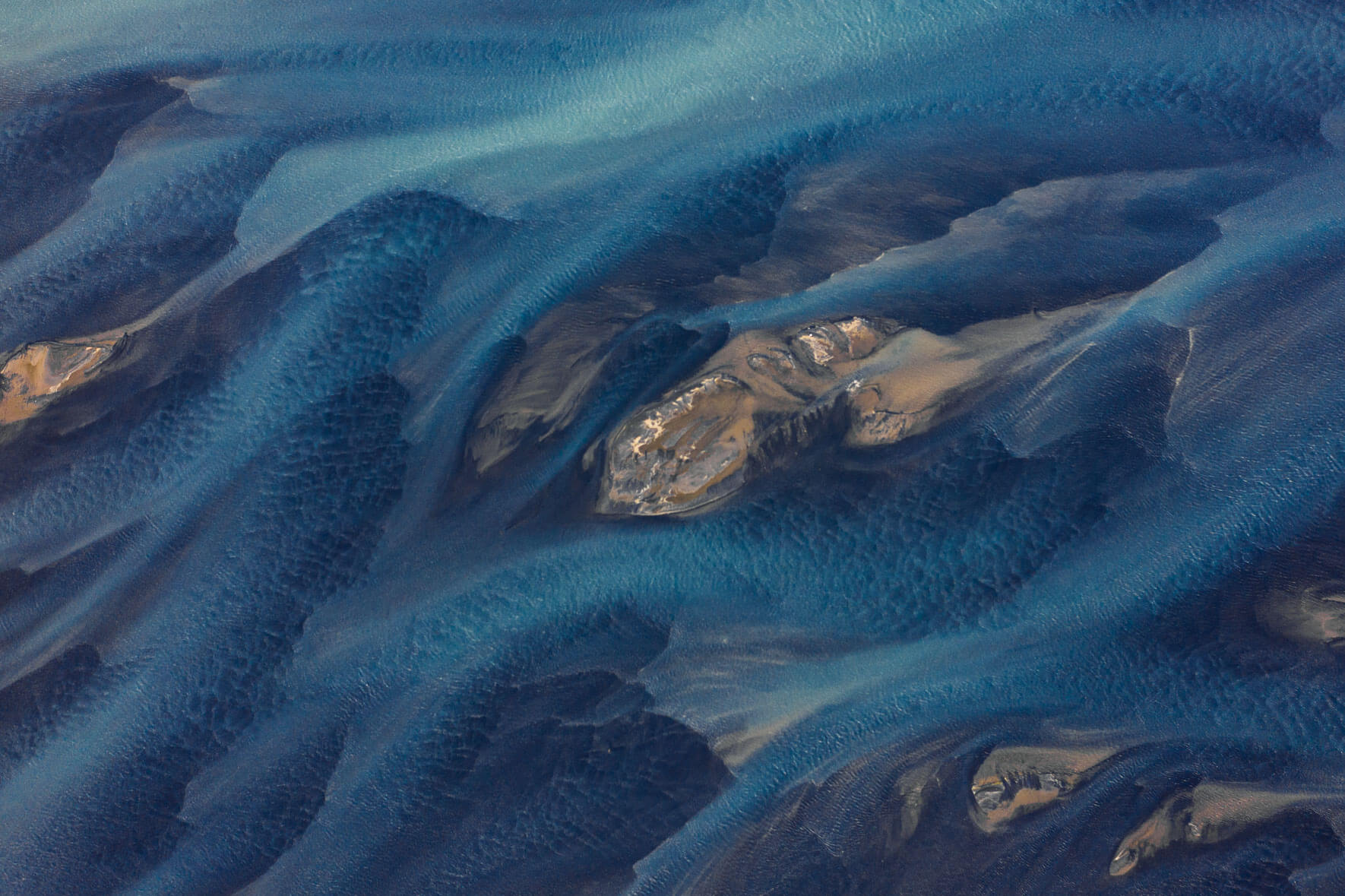 Aerial photograph of Holsa river on the south coast of Iceland with small sandbanks