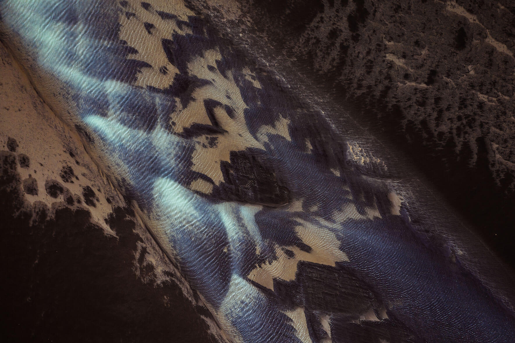 Abstract aerial view of tidal landscape on the south coast of Iceland