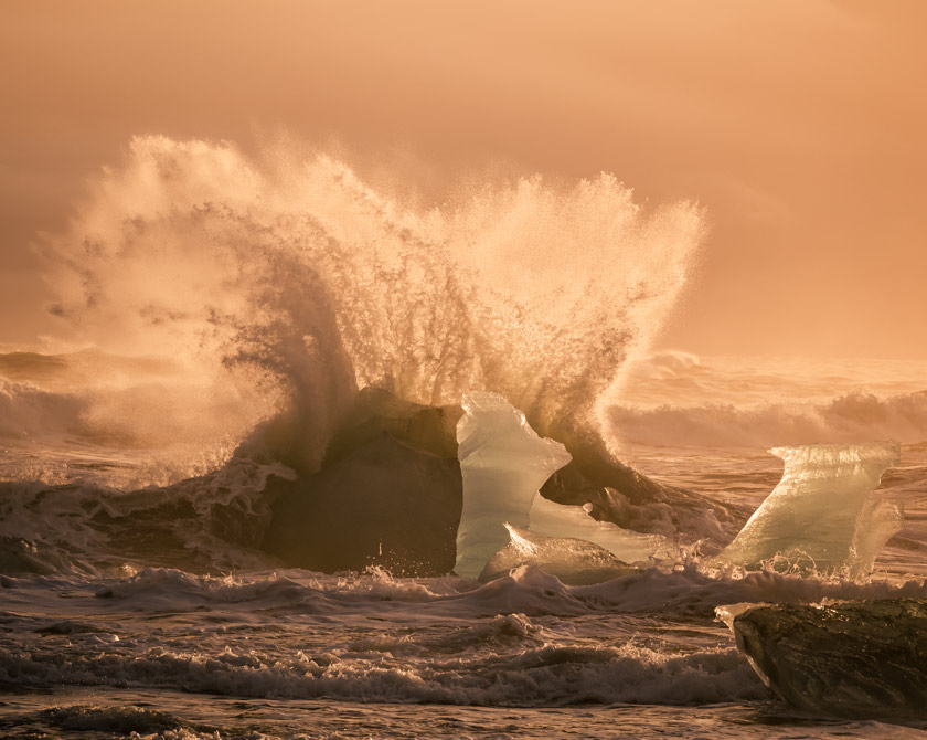 Waves Crashing at Icebergs on Diamond Beach near Jökulsárlón Glacier Lagoon in Iceland