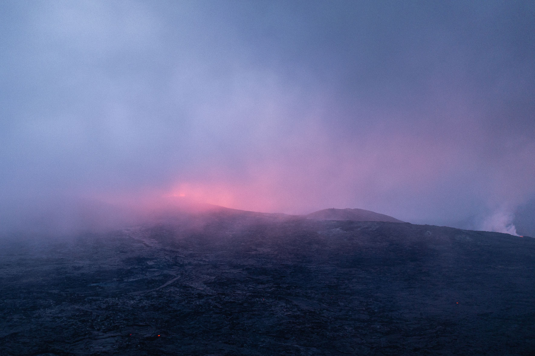 Aerial photograph of the crater of Fagradalsfjall volcano in Iceland covered in steam