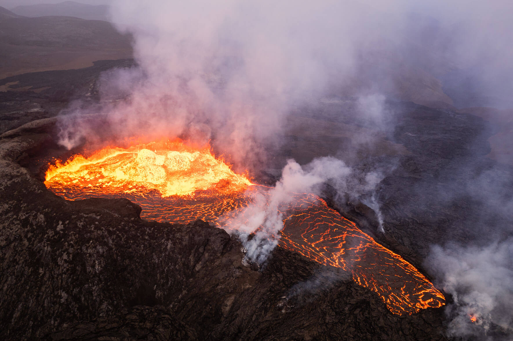 The bubbling crater of the Fagradalsfjall eruption in Iceland from an aerial perspective