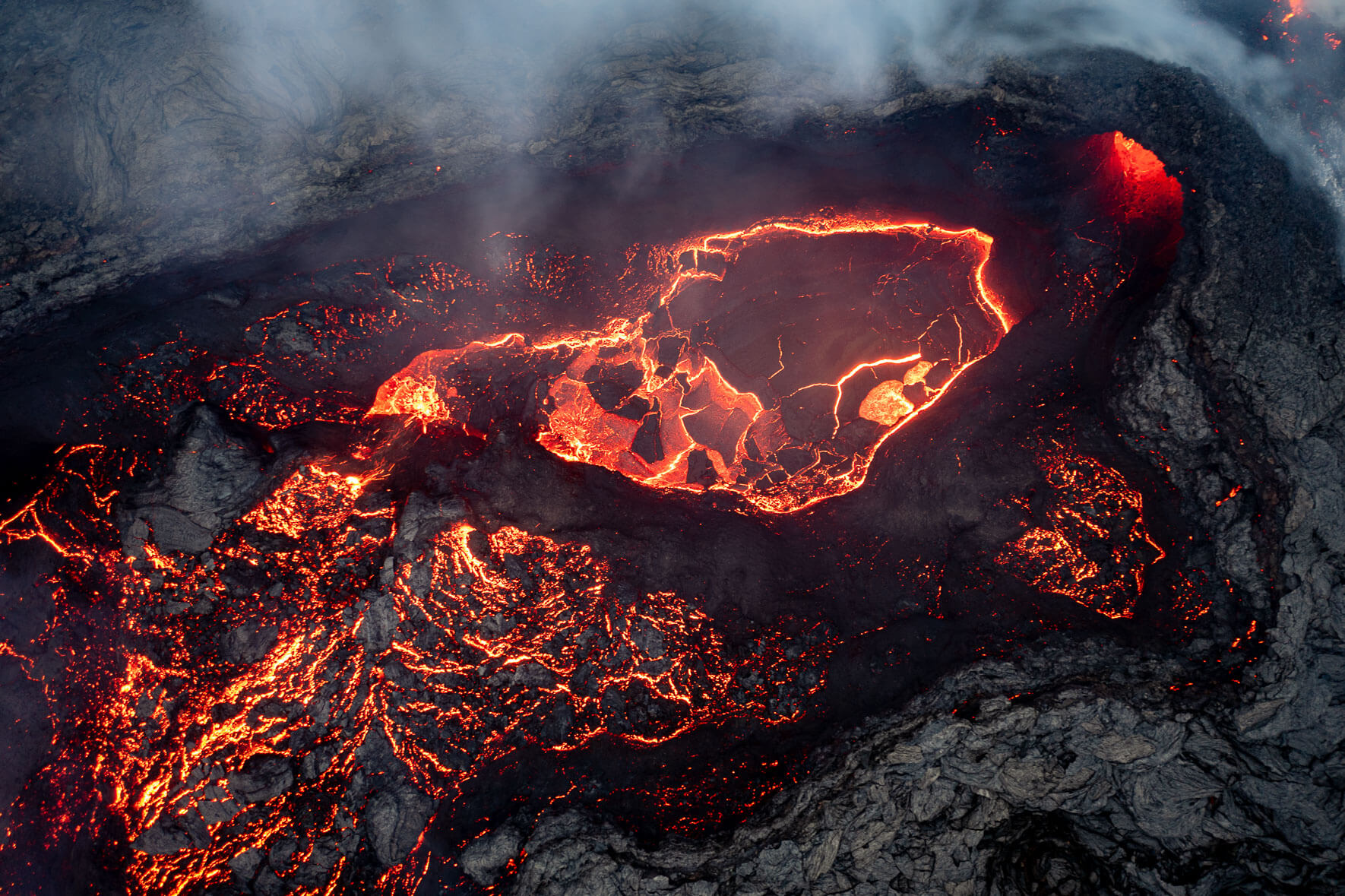 Aerial view of the crater of the Fagradalsfjall volcano in Iceland with cooling lava