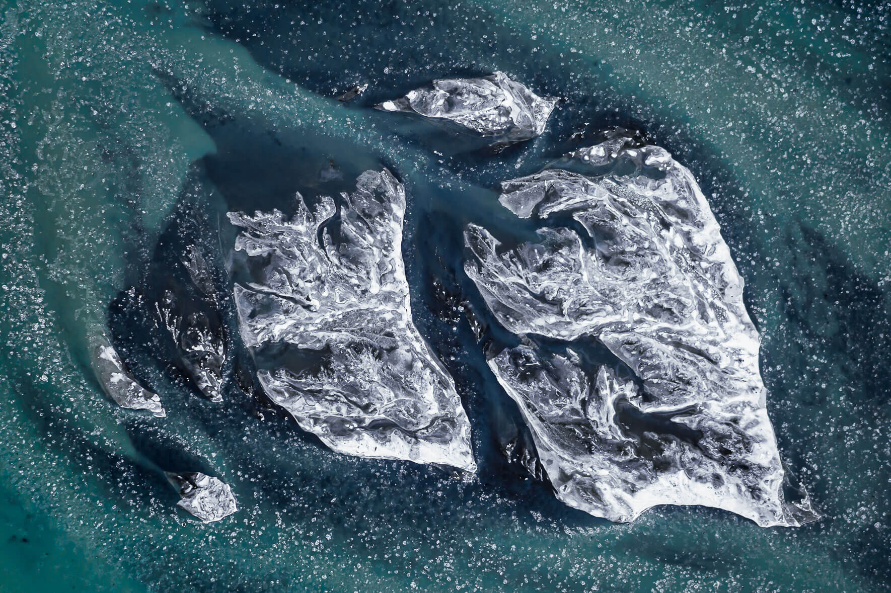 Glacier river Þjórsá on the south coast of Iceland in winter with ice floes and frozen over sand island