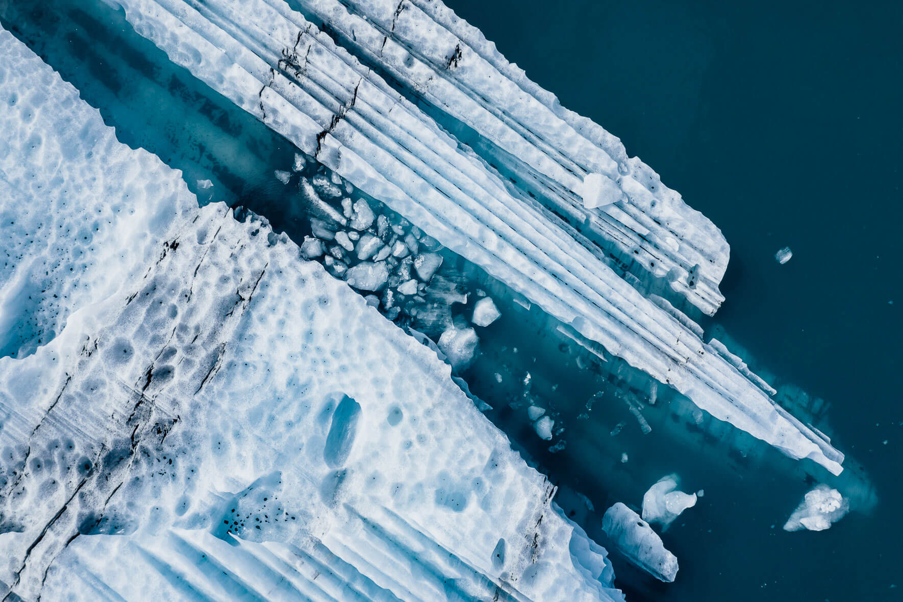 Iceberg with abstract patterns in a glacier lagoon in Iceland
