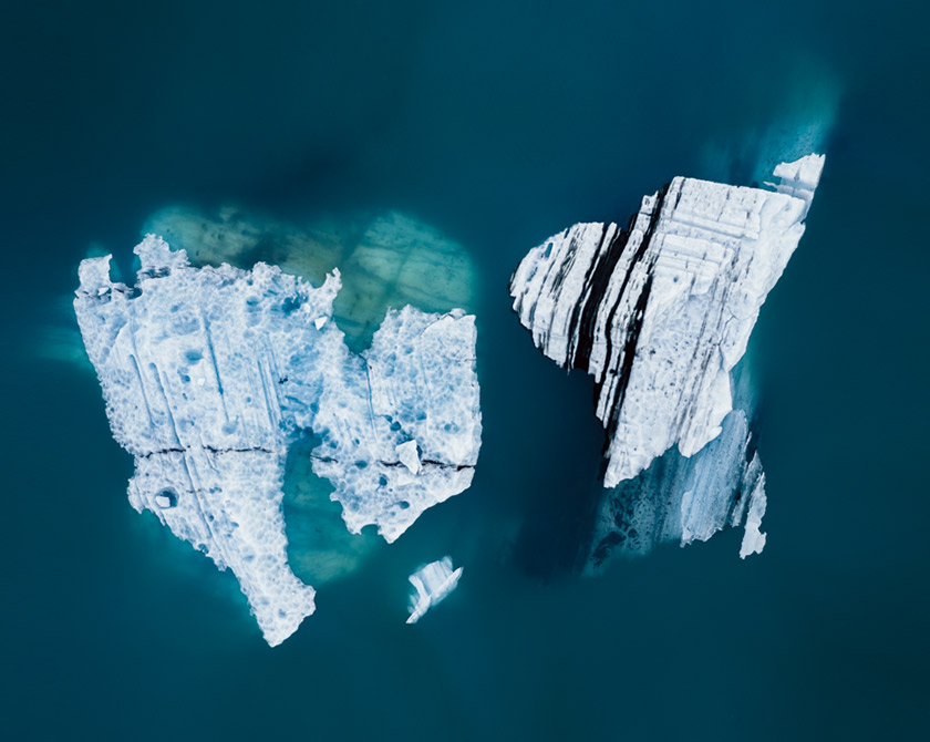 Aerial view of icebergs in turquoise glacier lagoon in Iceland
