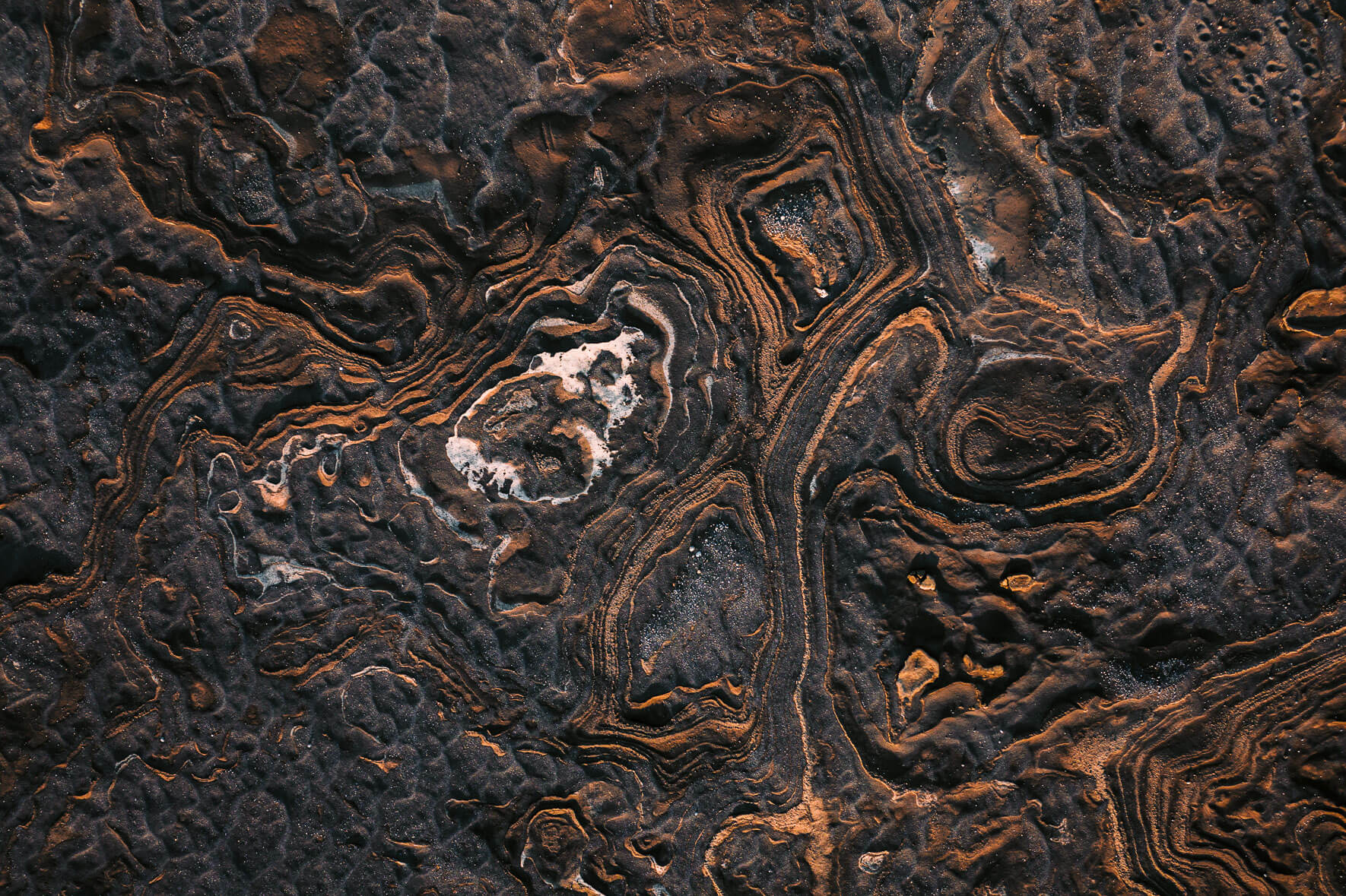 Rock and sand formations from an aerial perspective in Iceland (Vatnajökull region)