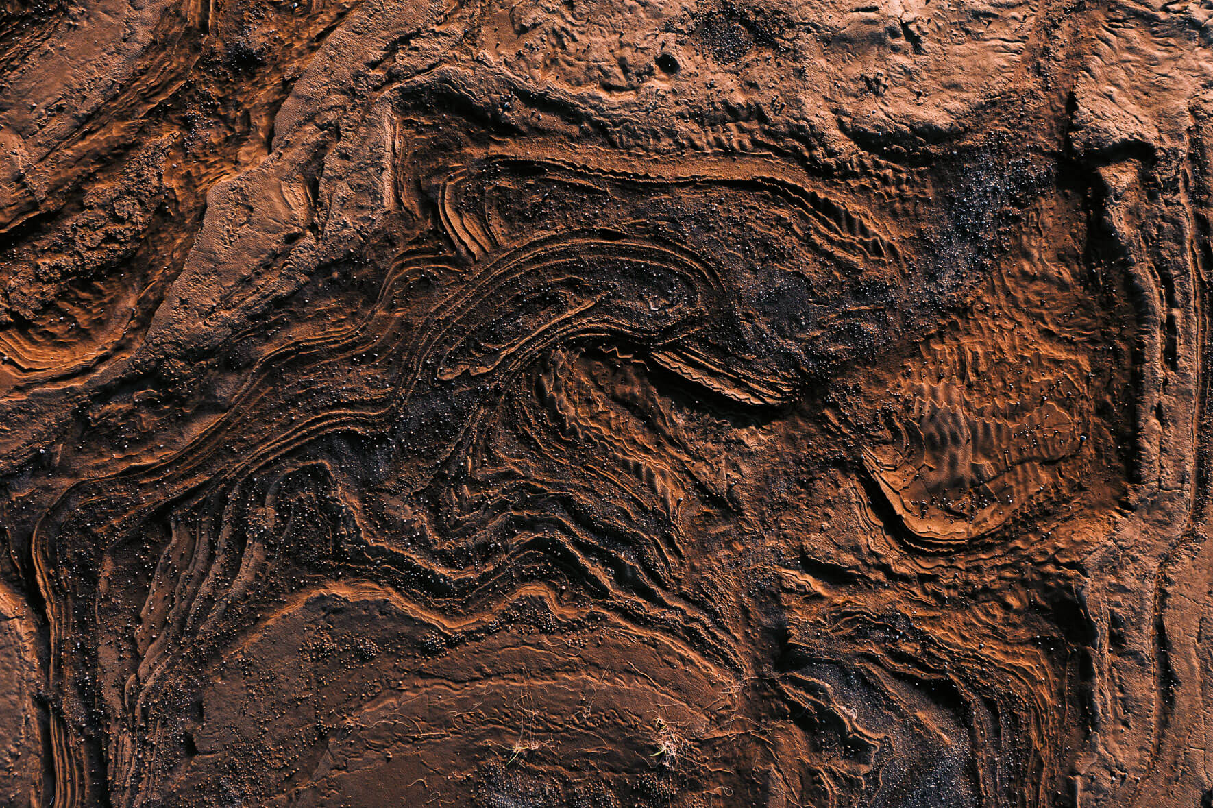 Abstract mud, rock and sand textures from an aerial view in Iceland
