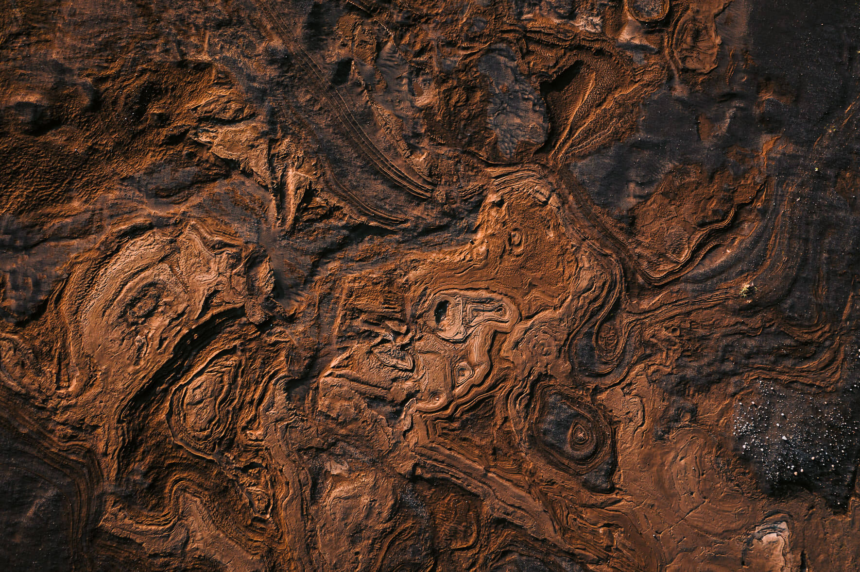 Abstract rock and sand formations from an aerial perspective in the Vatnajökull region in Iceland