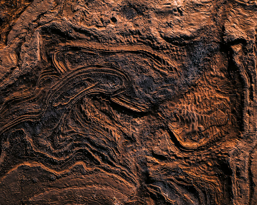 Abstract rock and sand formations from an aerial perspective in Iceland