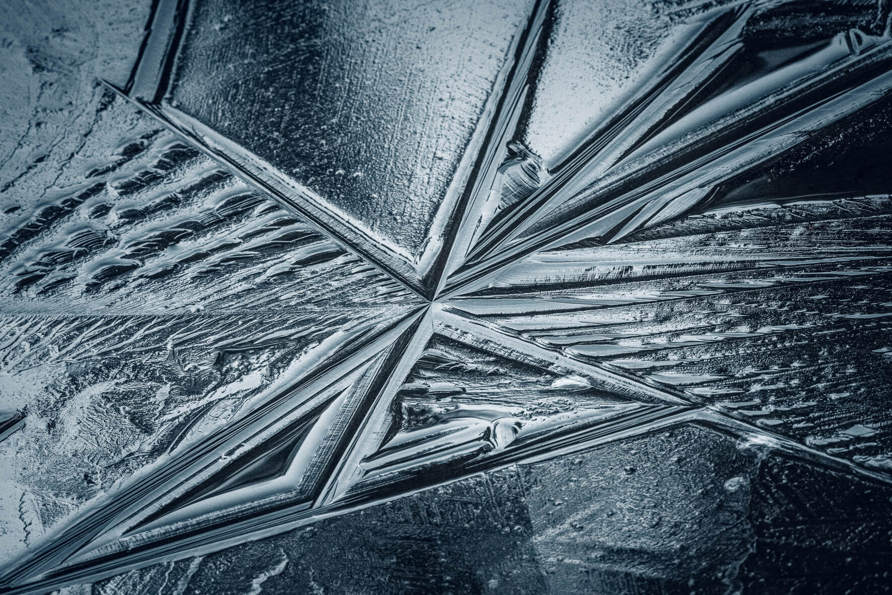Abstract textures in the surface of a frozen lake