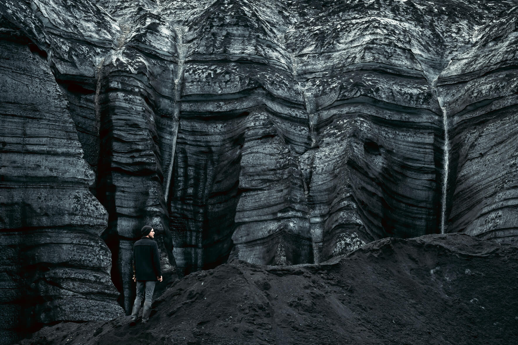 Dark glacier ice of Kötlujökull with small waterfalls (Mýrdalsjökull, Iceland)