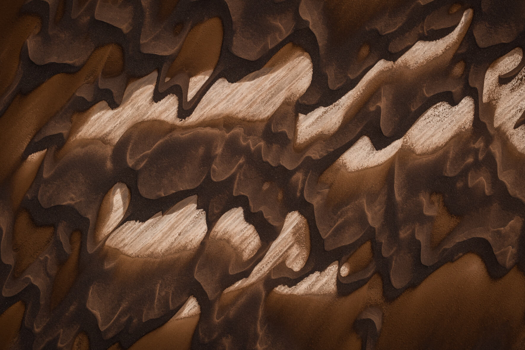 Abstract texture of dark and light sand in the highlands of Iceland