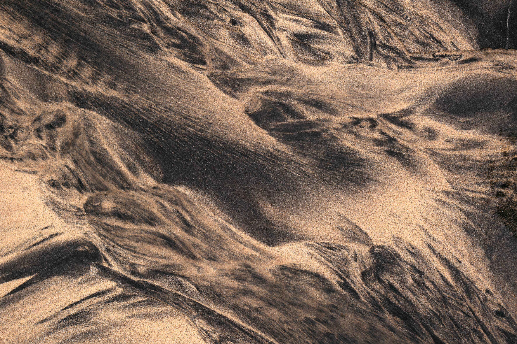 Aerial view of wave like textures in the sand in the Westfjords of Iceland