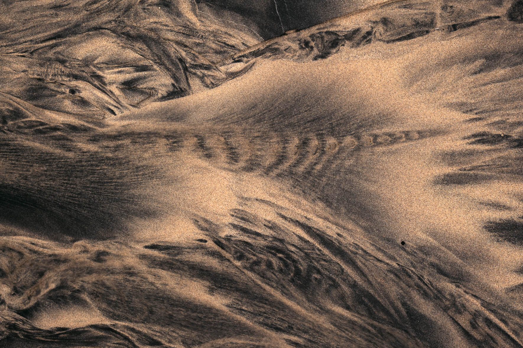 Aerial view of wave like textures in the sand in the Westfjords of Iceland