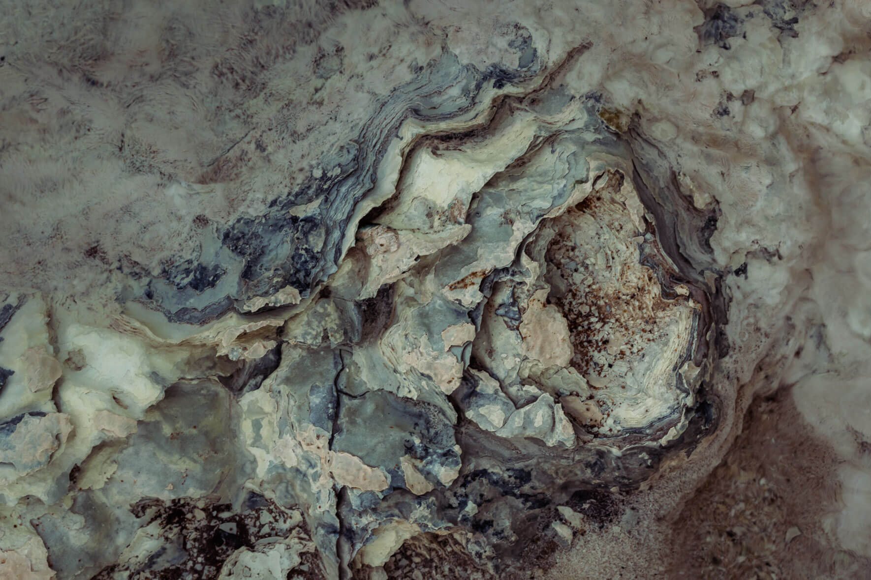 Abstract macro photography of a stream bed of a geothermal area in Mývatn region