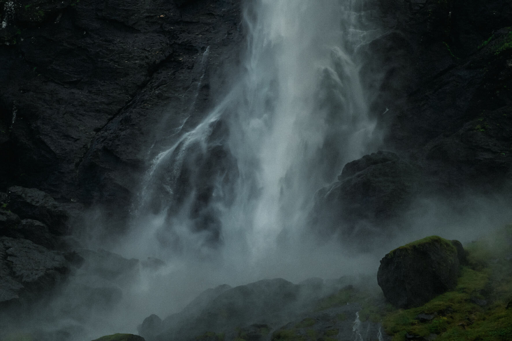 Dark and moody waterfall in Fjord Norway
