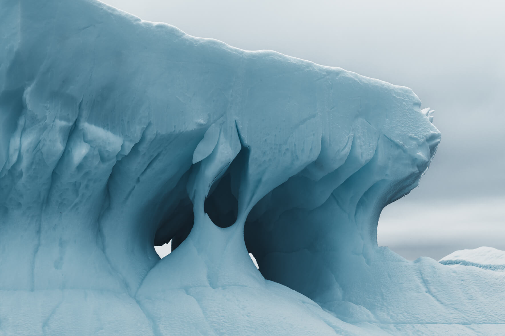 Abstract ice formations of a glacier in Antarctica