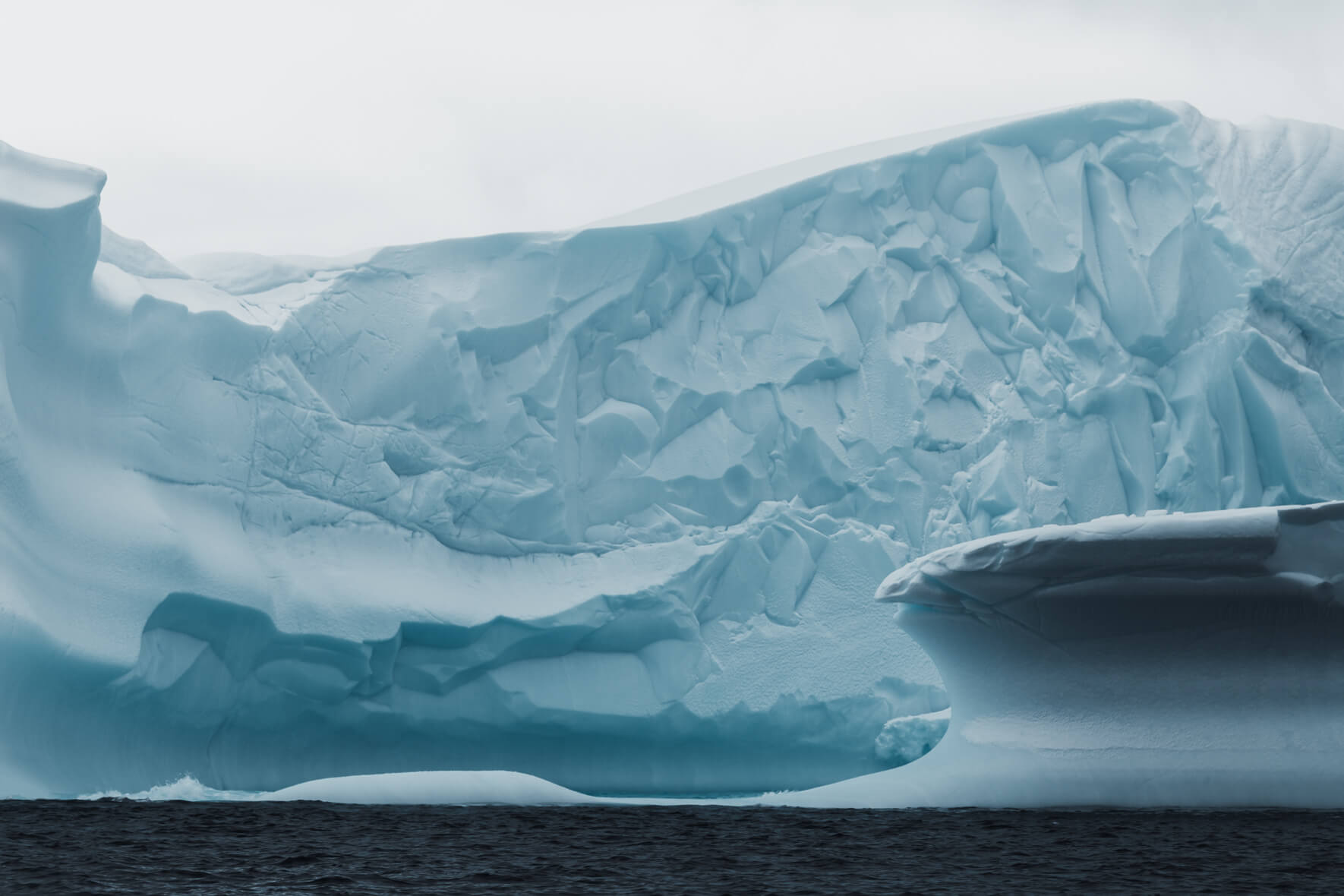 Textures in the ice of a massive iceberg in Antarctica (Gerlache Strait)