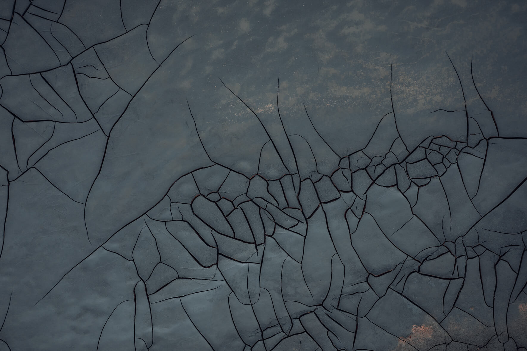 Patterns of cracked mud formations in Námafjall geothermal area, Iceland